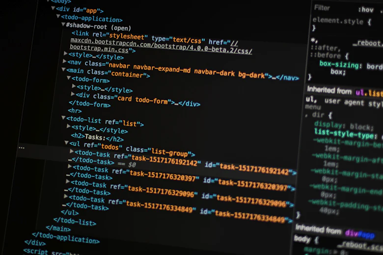 Écran affichant du code HTML sur fond sombre.