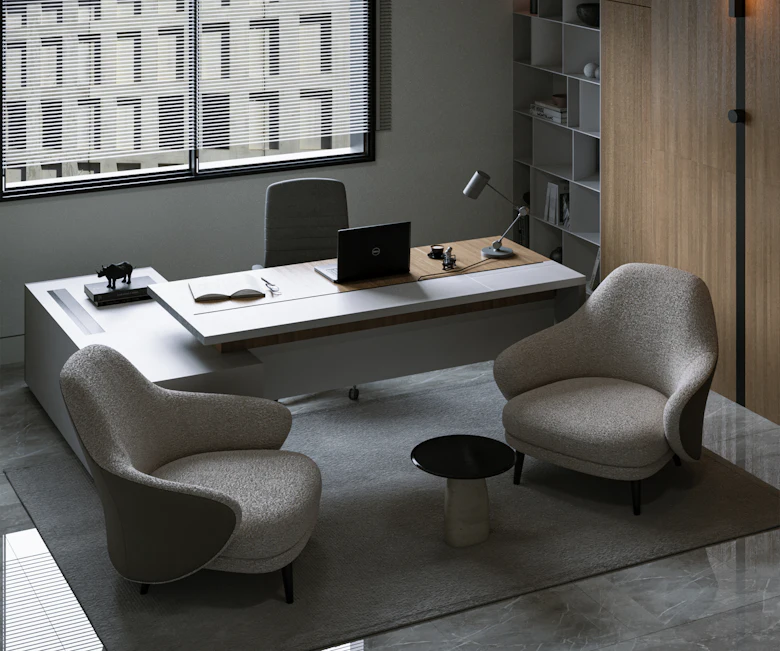 Coin de bureau contemporain, deux fauteuils et une lumière douce.